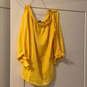 Yellow off-the-shoulder blouse